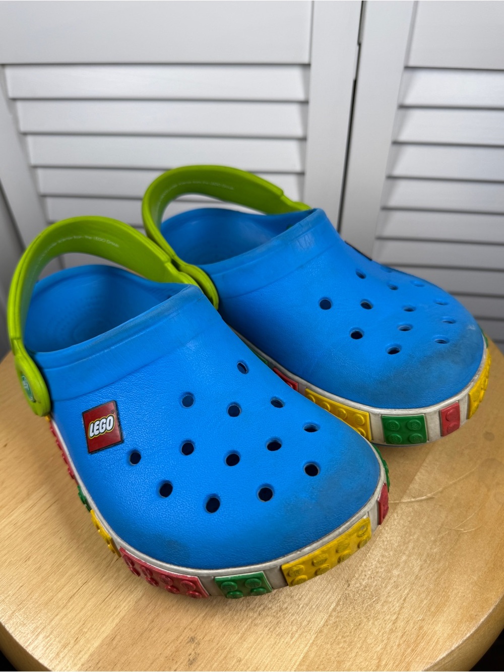 Lego Bright Blue Kids Crocs with Lime Green Heel Strap and Multicolor Brick Trim